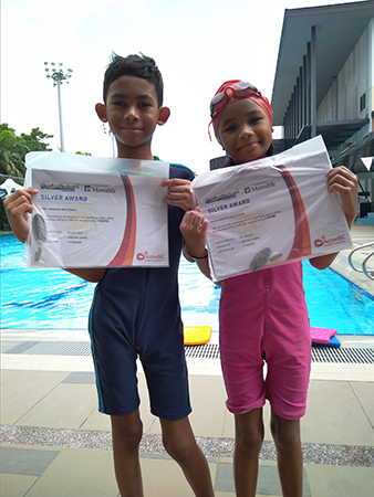 Kids with Swim Safer Silver Awards